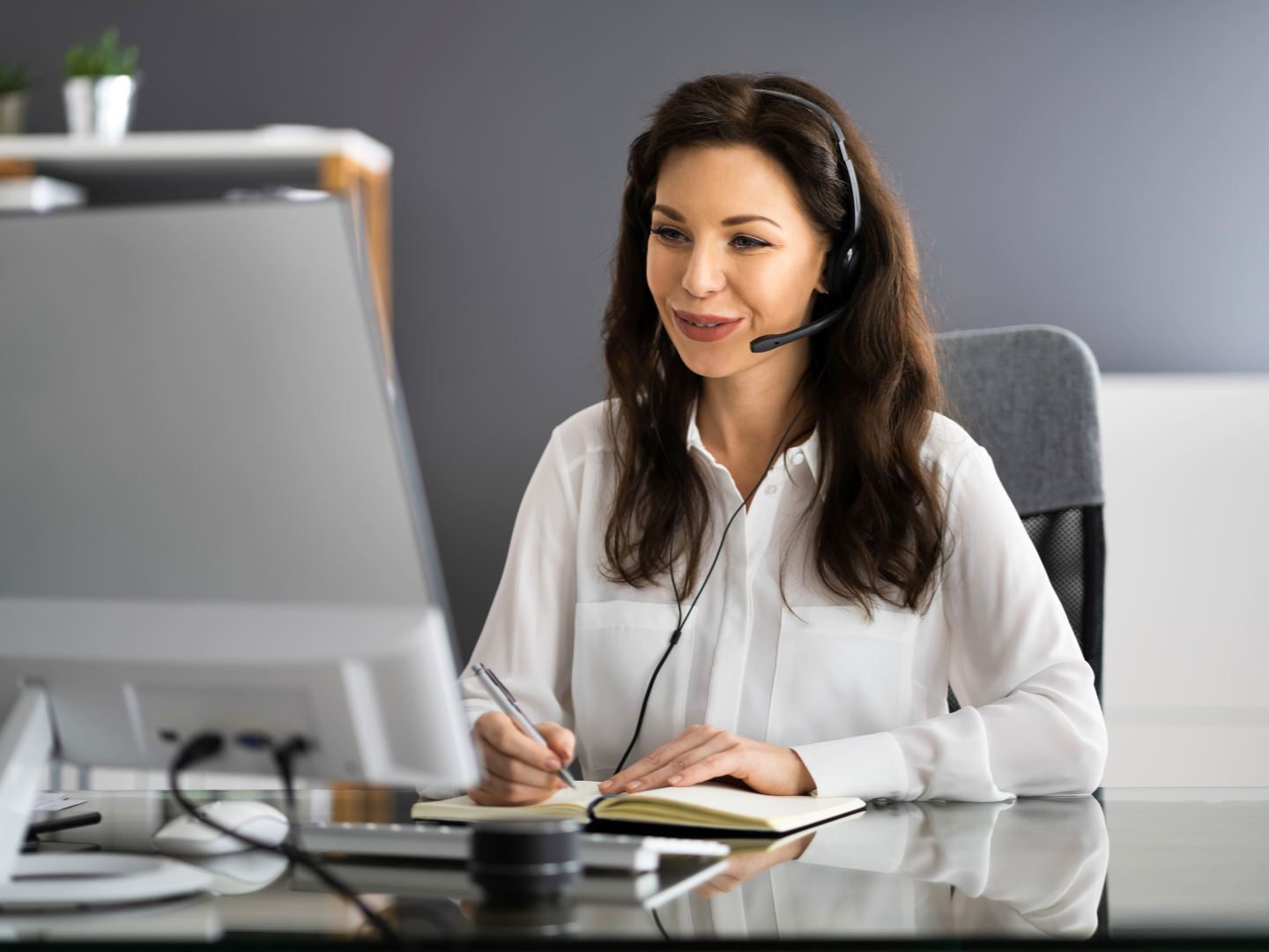 outsourced virtual assistant attending a meeting with client