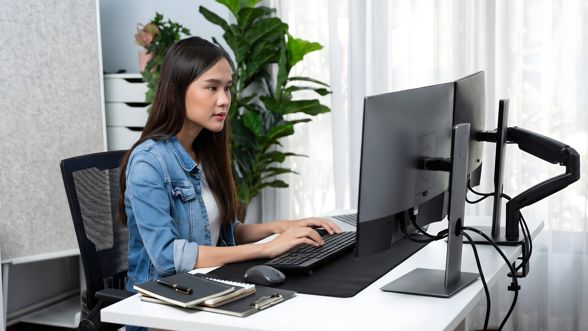 vietnamese woman a remote fullstack developer typing on a computer
