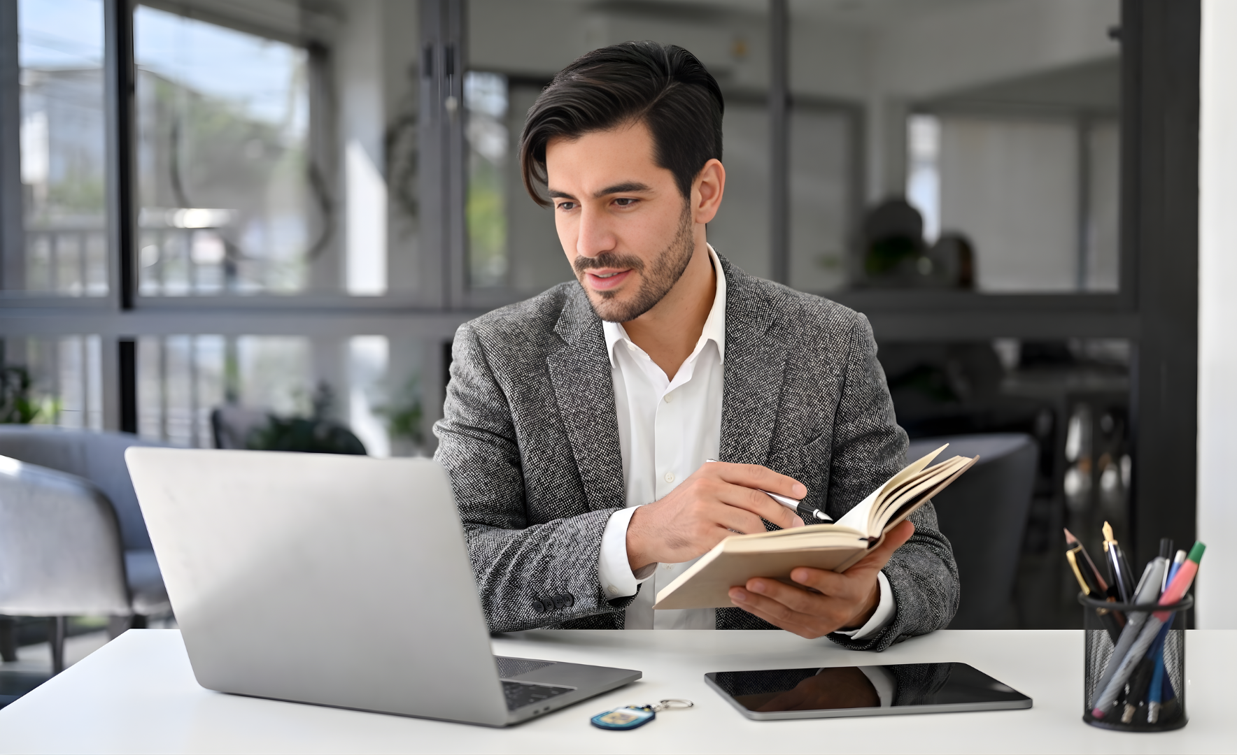 virtual operations manager in argentina writing in a notebook