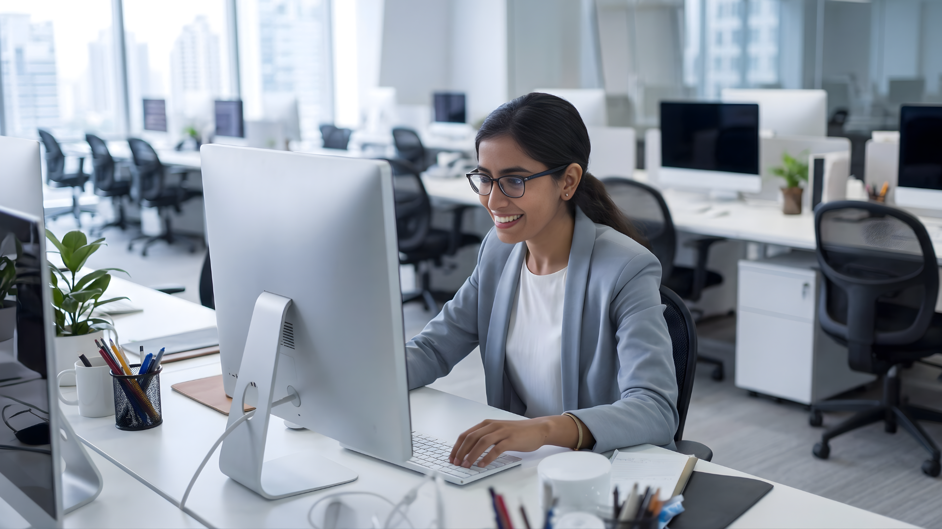 certified salesforce administrator working in a bright corporate office