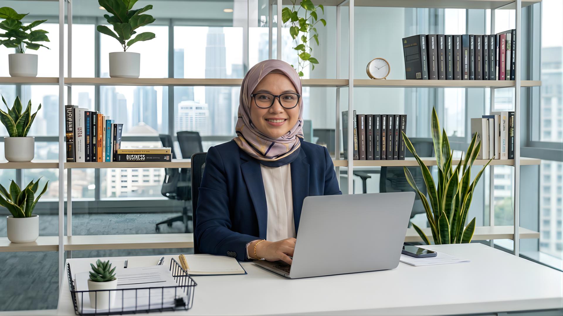 remote compliance officer wearing a hijab in a bright office