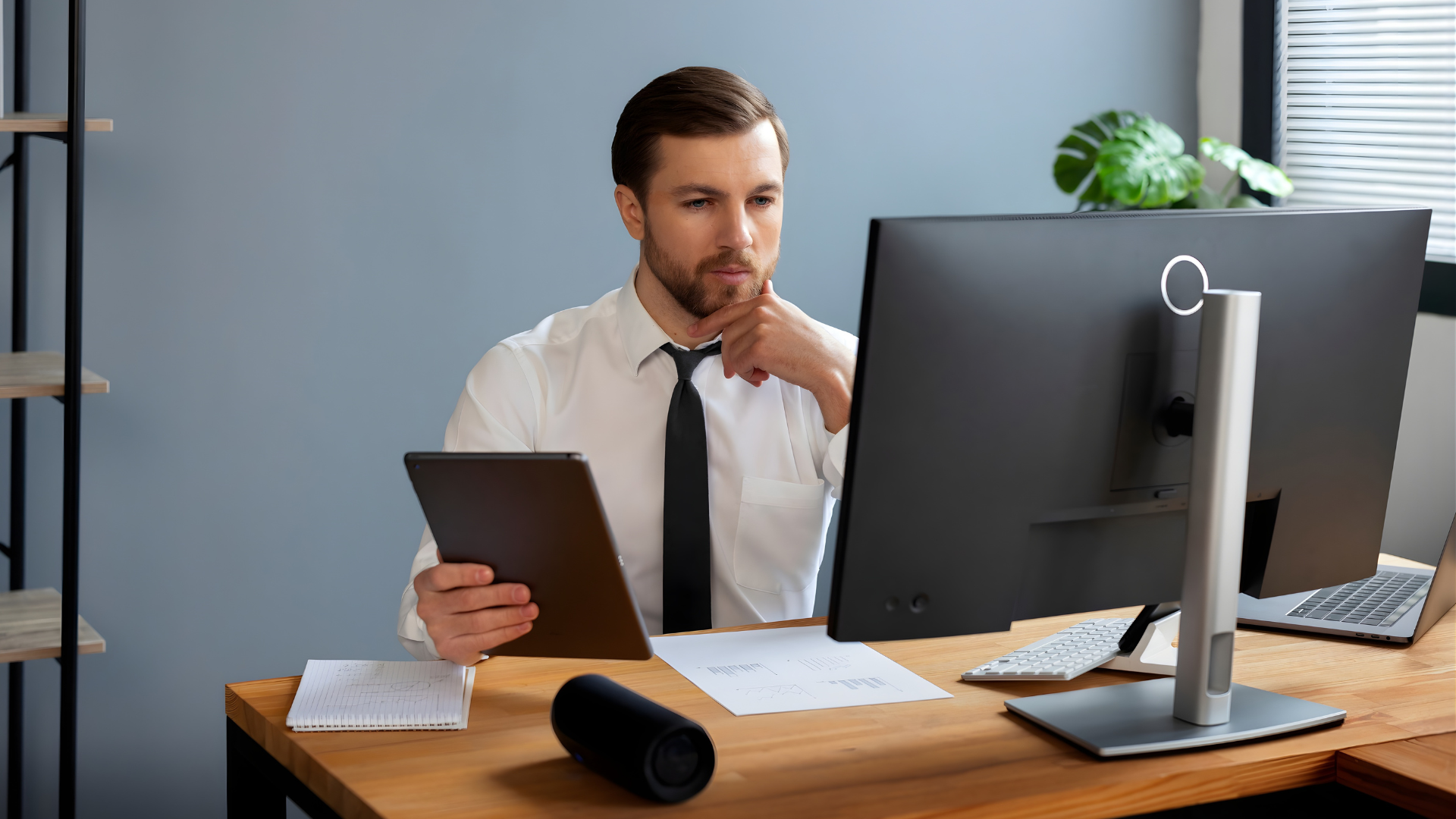 offshore tax accountant in argentina looking at the monitor