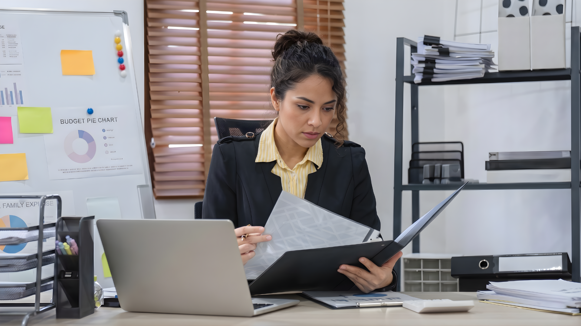 latina offshore internal auditor reading financial documents
