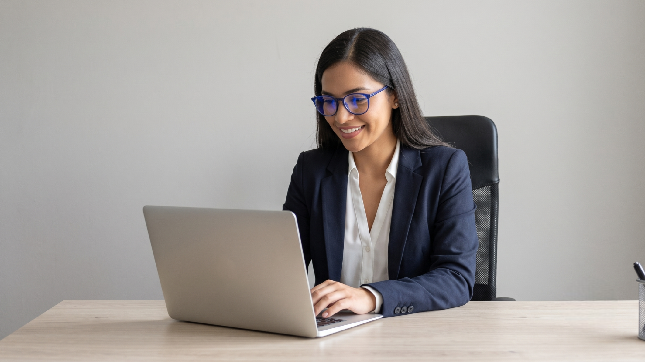 confident executive handles core business strategy, having moved routine tasks to a specialist hr administrative outsourcing provider