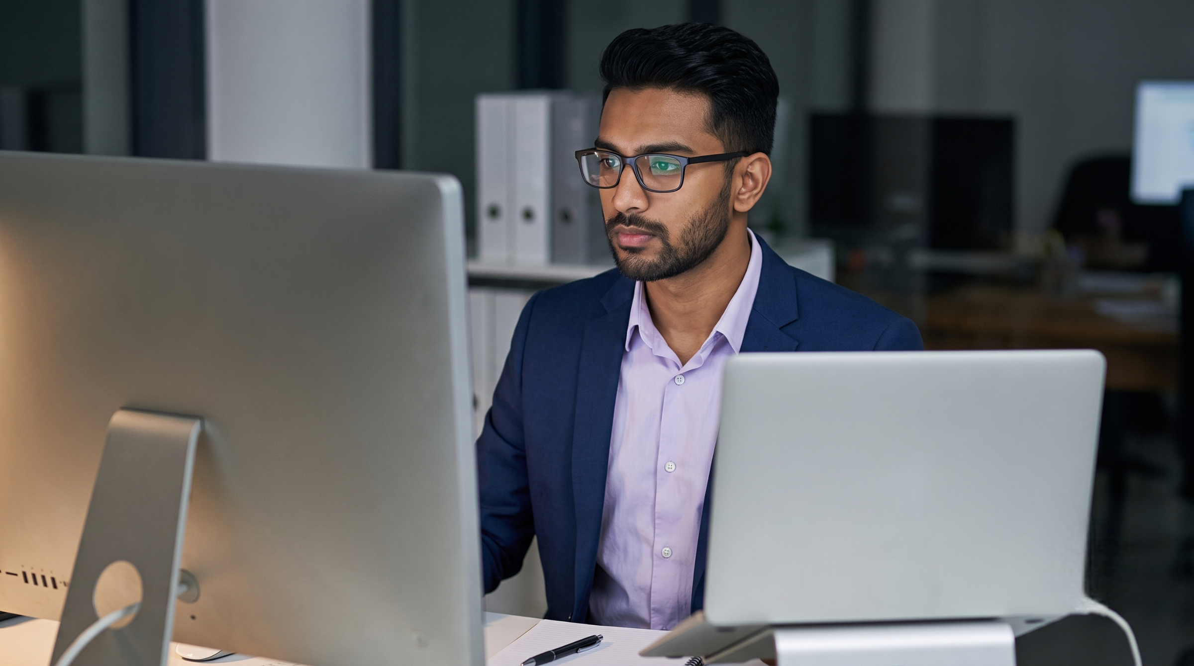 A professional remote platform engineer managing cloud operations from a computer terminal