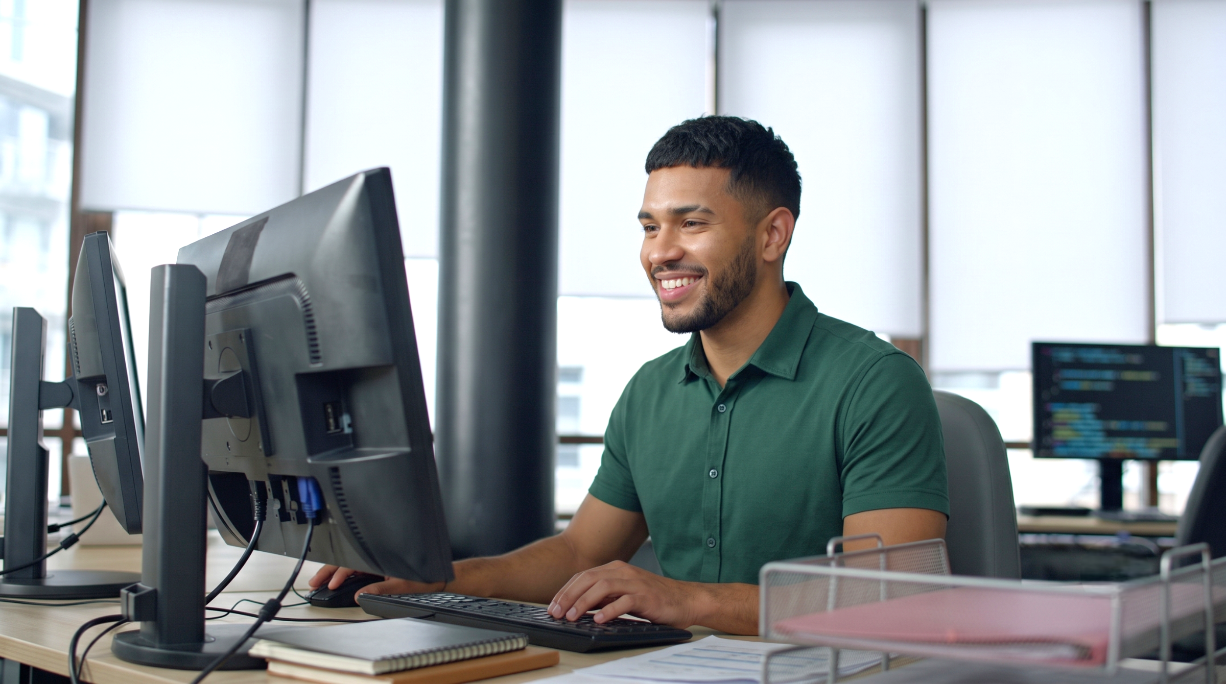 Professional female IT security consultant working remotely at an office desk