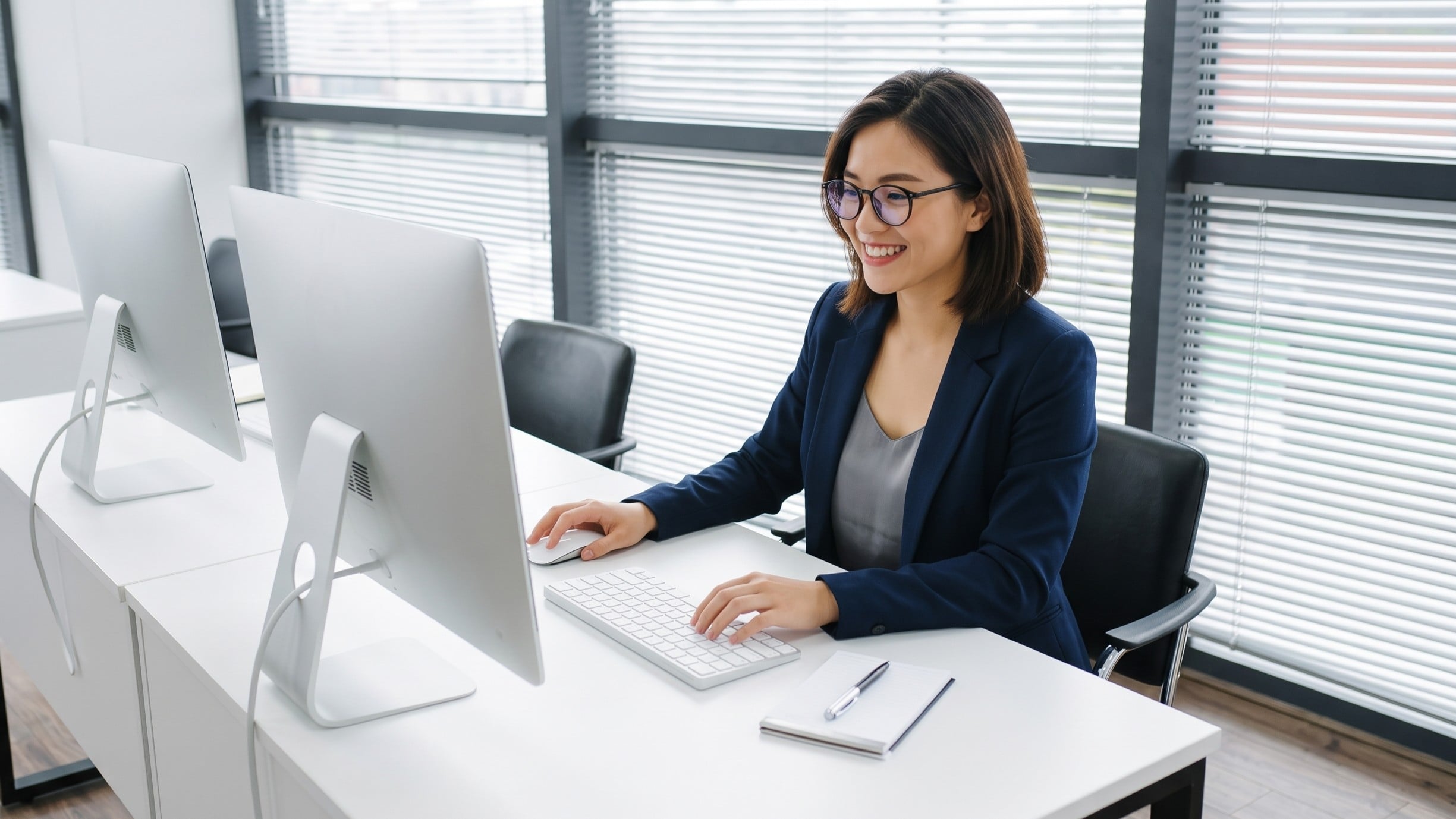vietnamese candidate support coordinator outsourcing specialist working with a computer