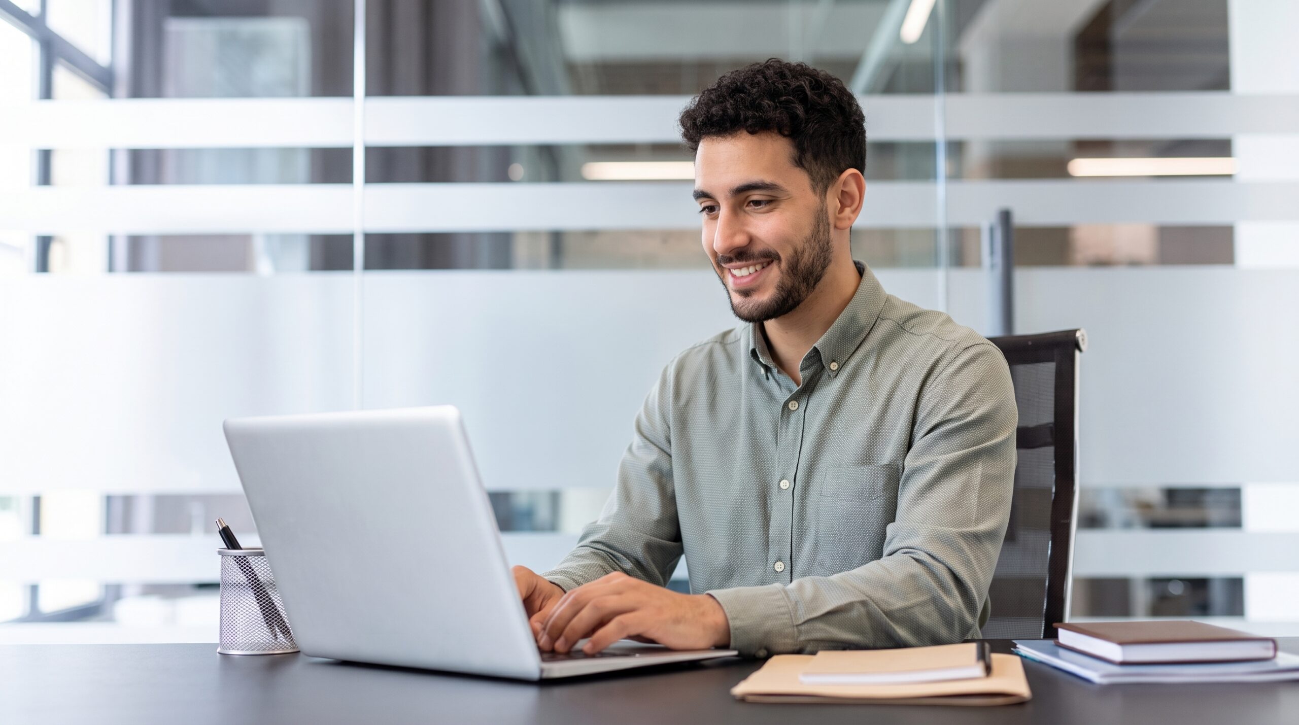 Remote enterprise architect working at a computer