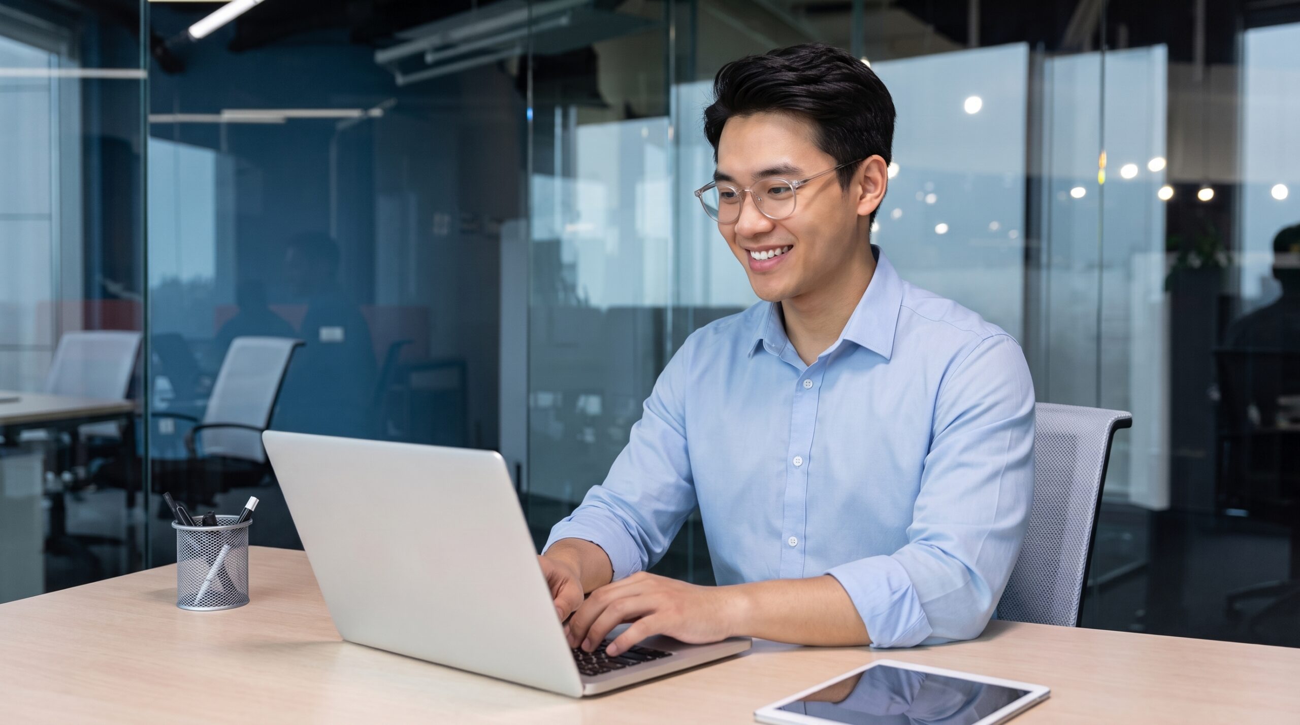 Enterprise architect staffing professional working on a laptop